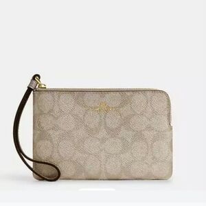 Coach Corner Zip Wristlet In Metallic Signature Canvas